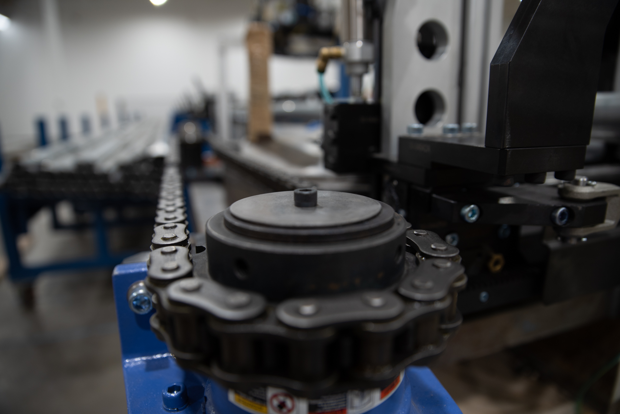 Optimizing Manufacturing Efficiency with Automated Material Handling: A Guide by Adaptive Innovations